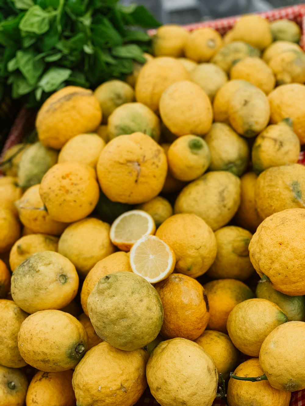 yellow round fruits on brown wooden table