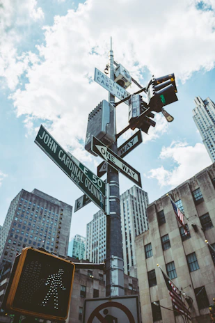 Lighting and signaling equipment being mounted on a busy urban street