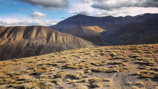 brown mountain under white sky during daytime in Ladakh India