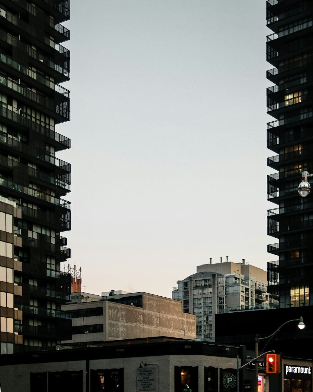 brown concrete building under gray sky