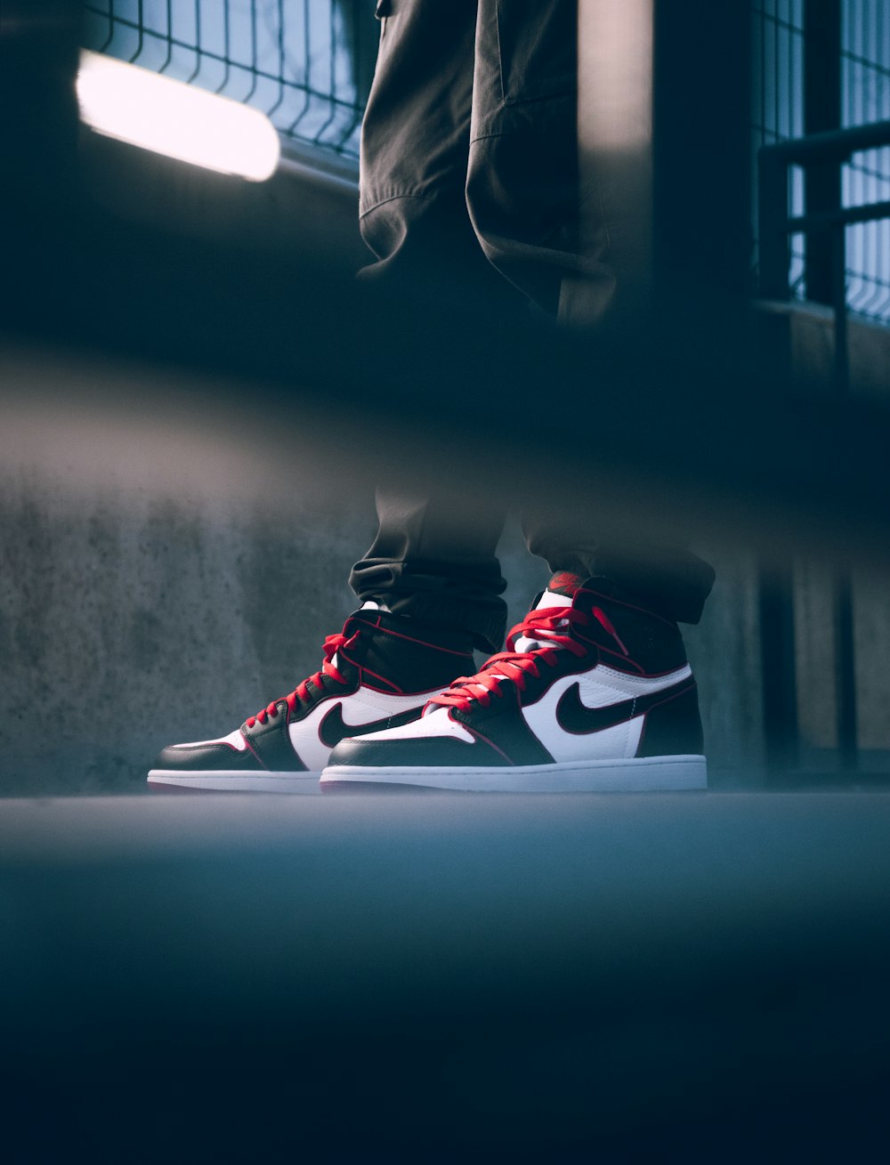 black red and white nike sneakers
