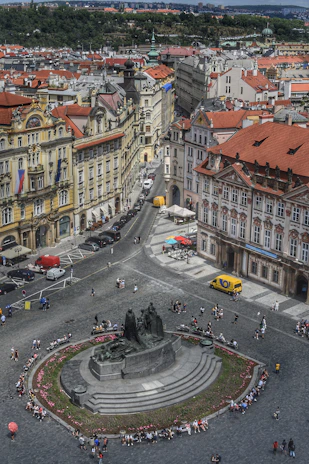 A panoramic view of a bustling Michoacán town square with people engaging in daily activities