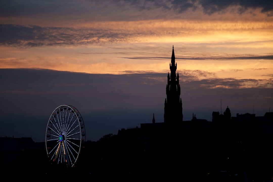 silhouette of windmill during sunset