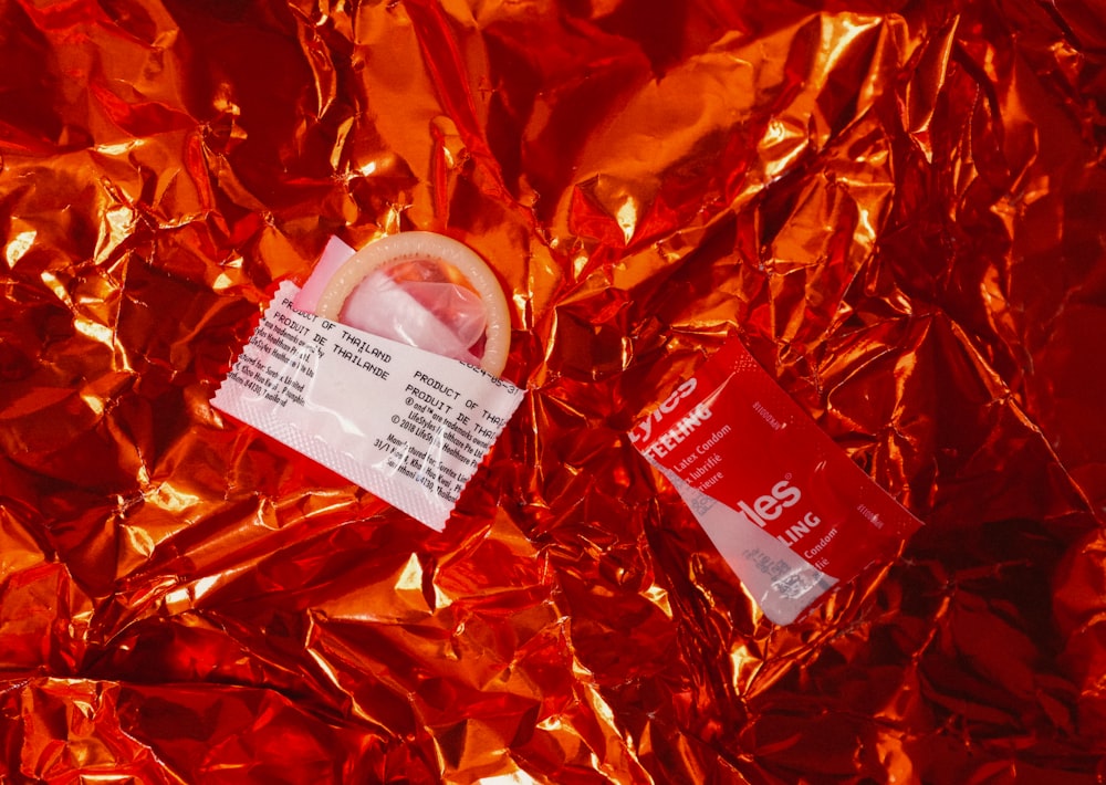 white and red plastic pack