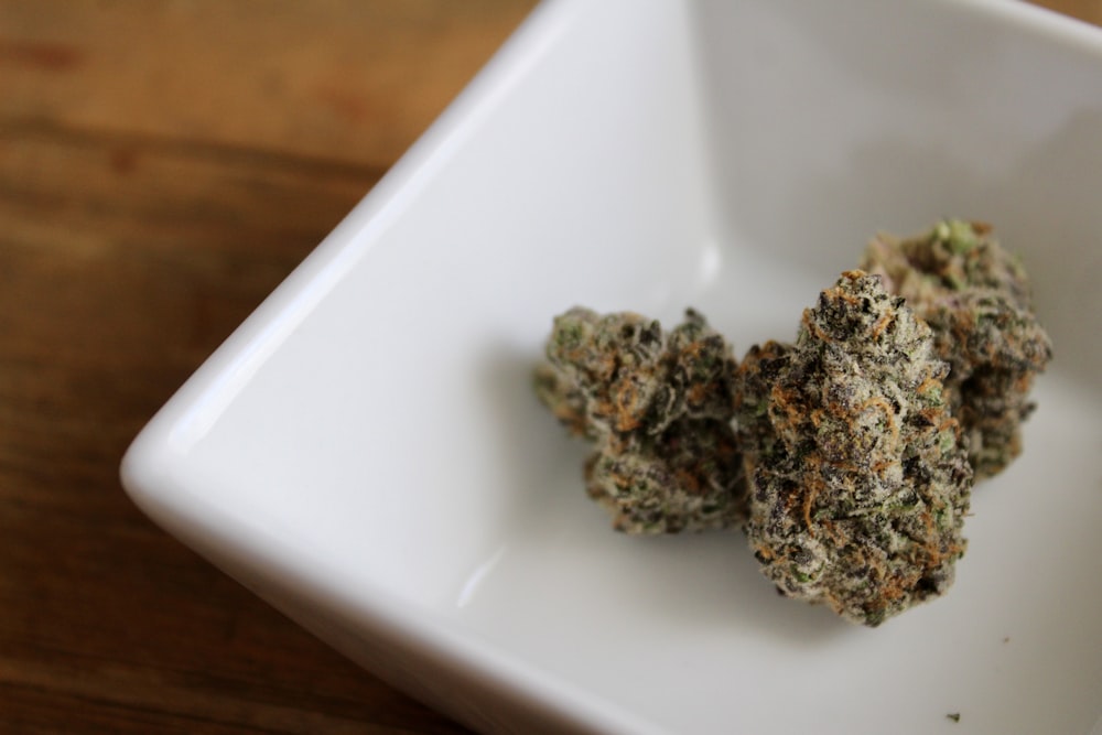 green kush on white ceramic plate