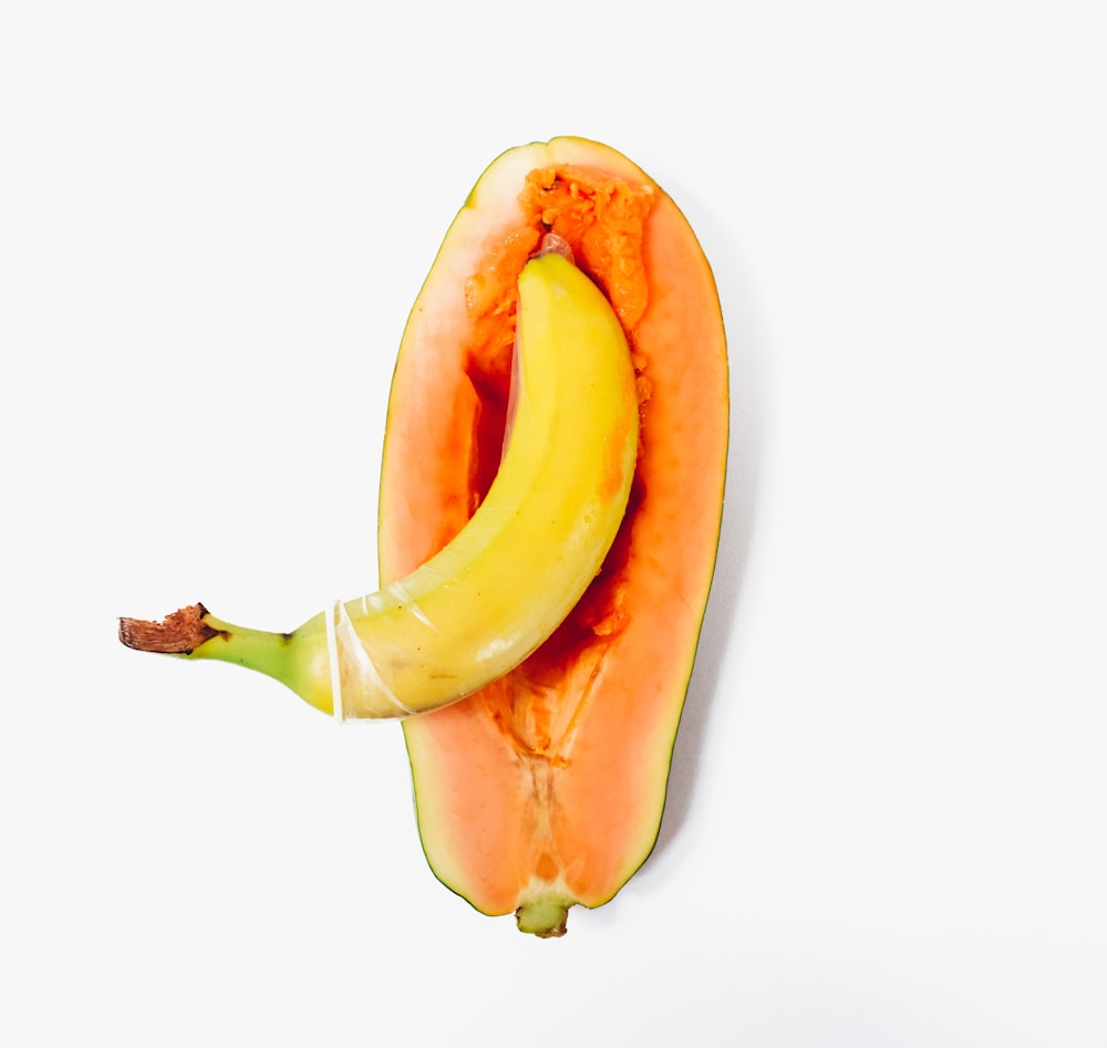 yellow banana on white surface