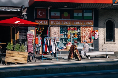 A vibrant storefront with colorful sale banners attracting customers