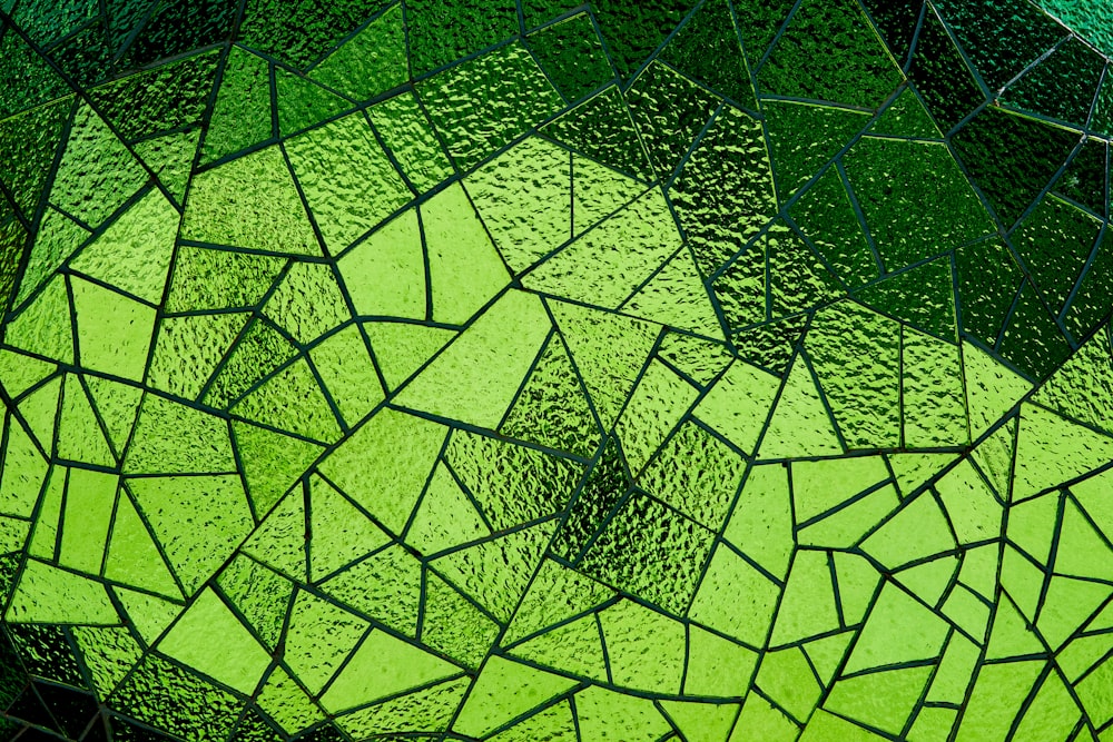 grünes und schwarzes quadratisches Muster