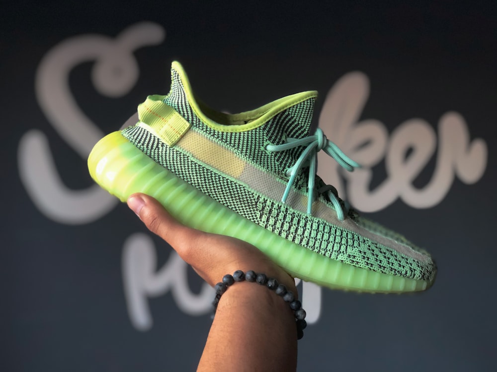 Green adidas yeezy boost 350 v 2 photo – Free Footwear Image on Unsplash