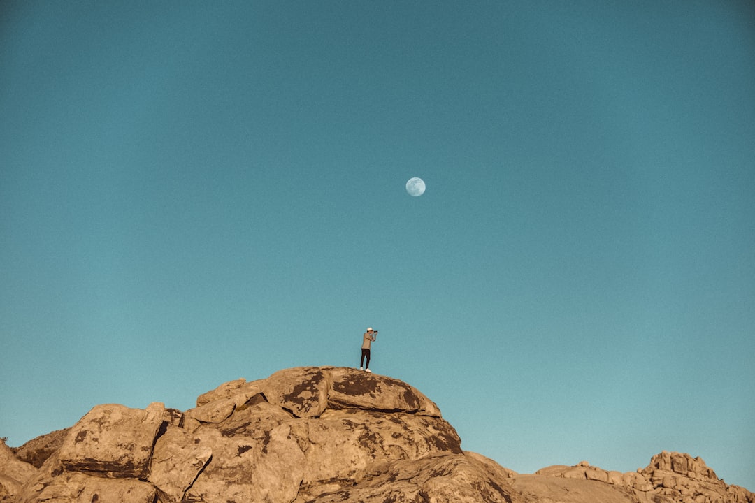 brown rock formation under blue sky during daytime