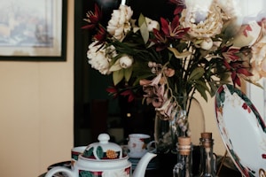 An elegant arrangement of home decor items on a stylish table.