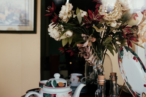 An elegant arrangement of home decor items on a stylish table.