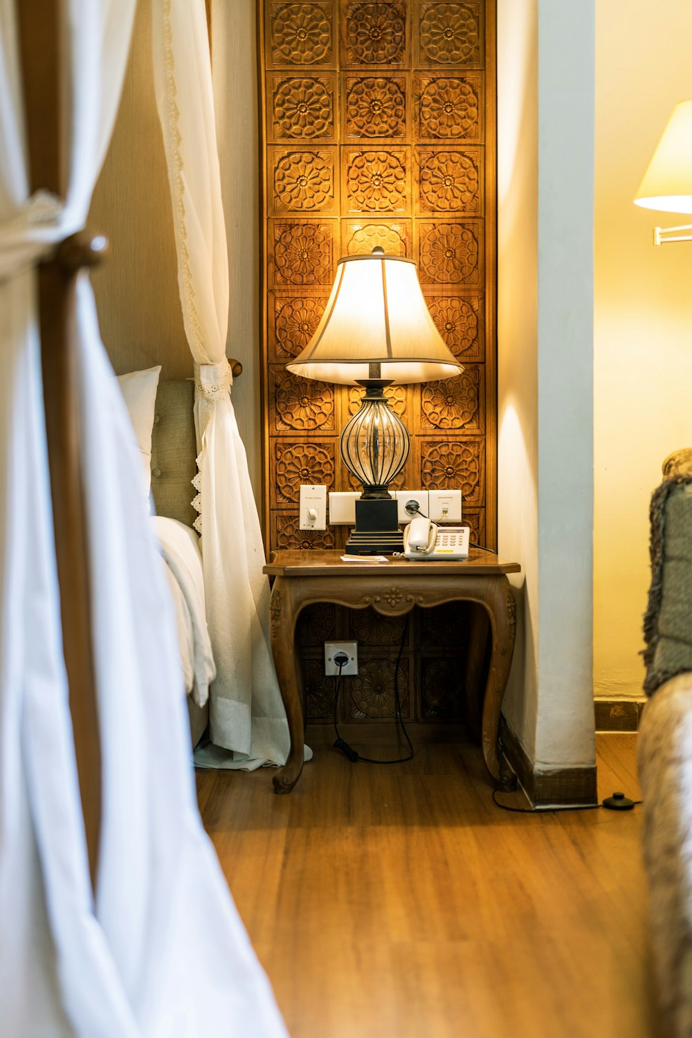 white table lamp on brown wooden table