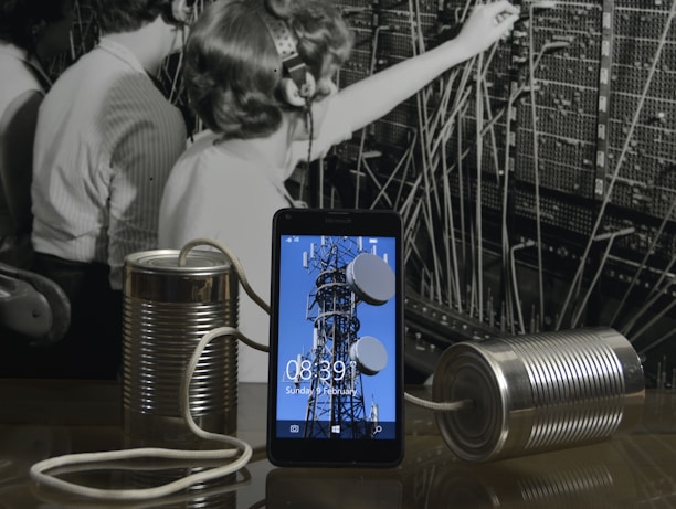 A sleek black and white image representing various communication services.