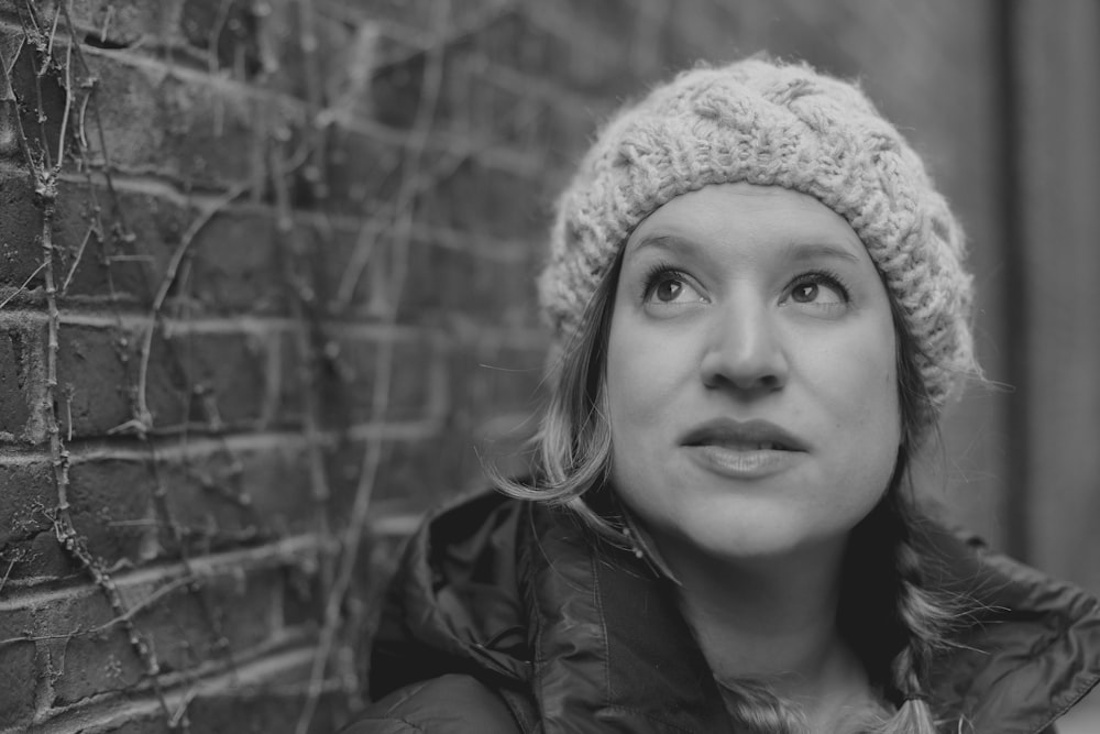 grayscale photo of woman wearing knit cap