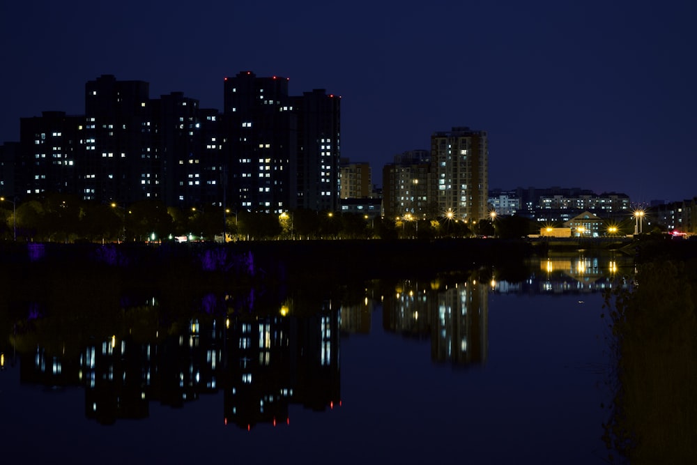 city skyline during night time