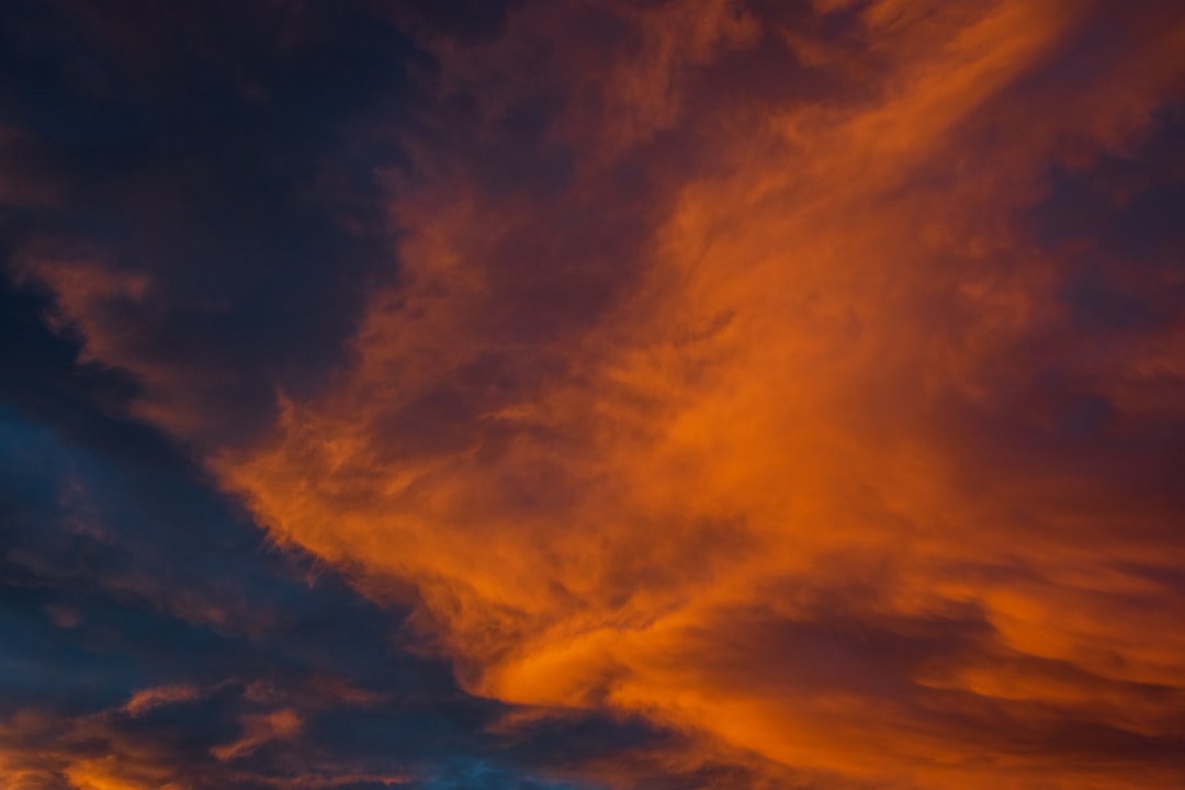 orange and blue cloudy sky during sunset