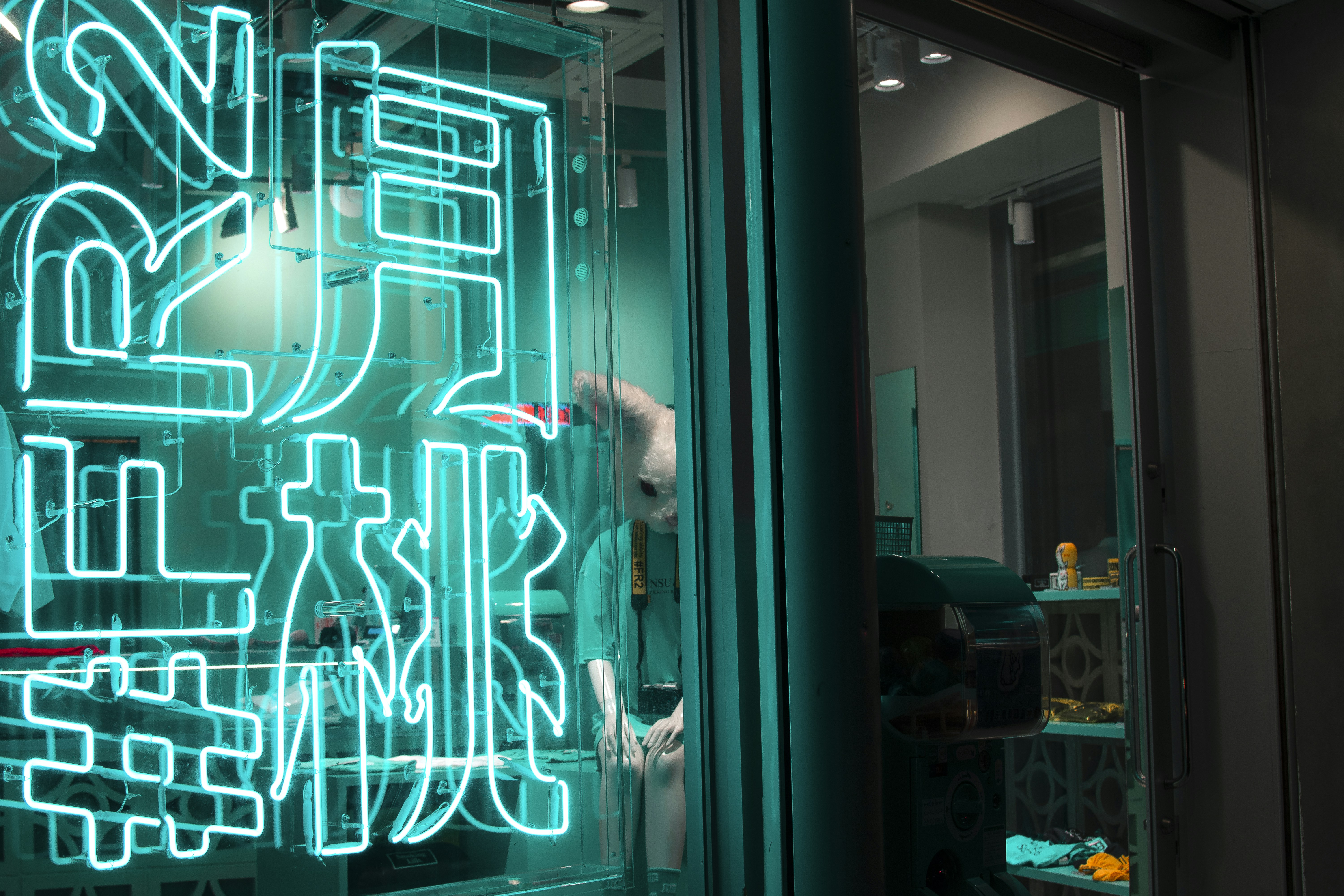 blue neon light signage turned on during daytime
