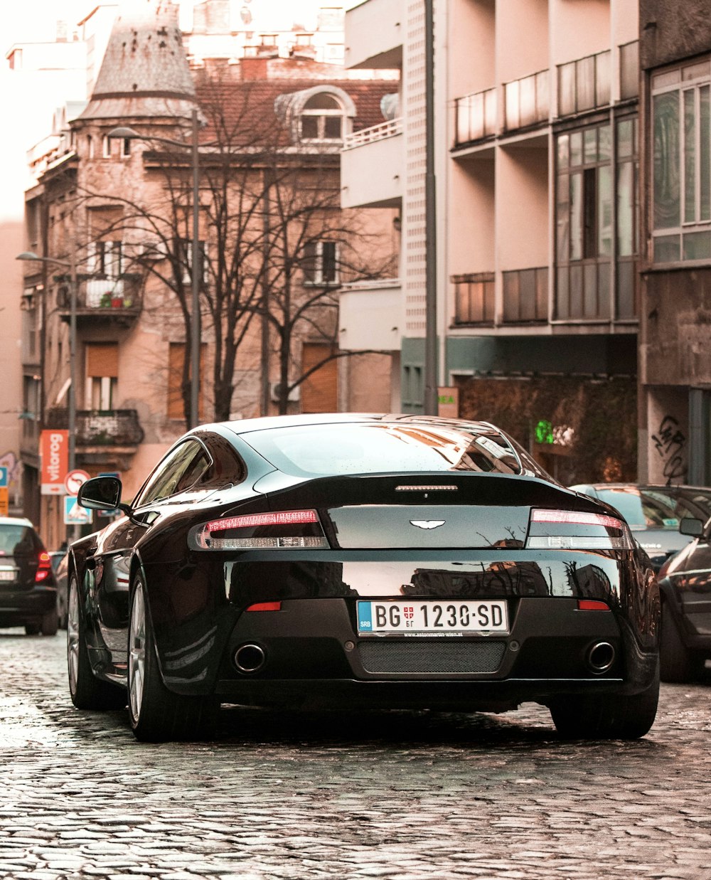 black porsche 911 parked on street during daytime