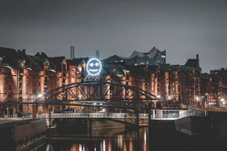 bridge over river during night time