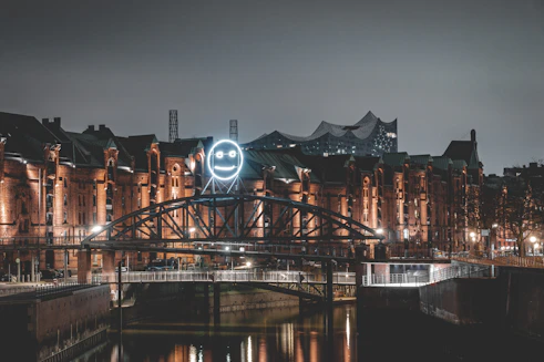 bridge over river during night time