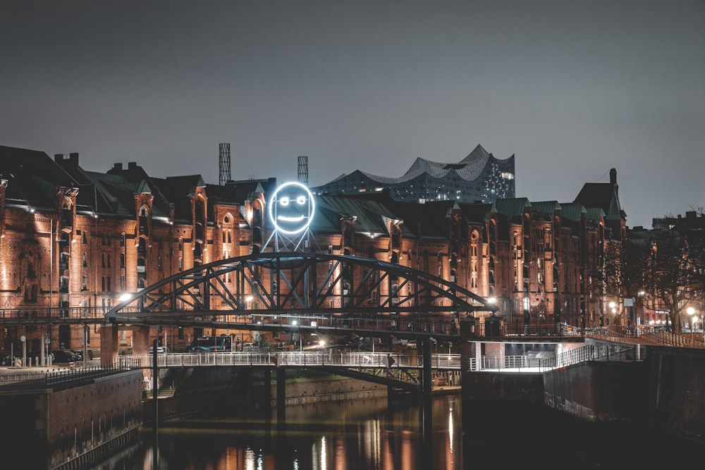 bridge over river during night time