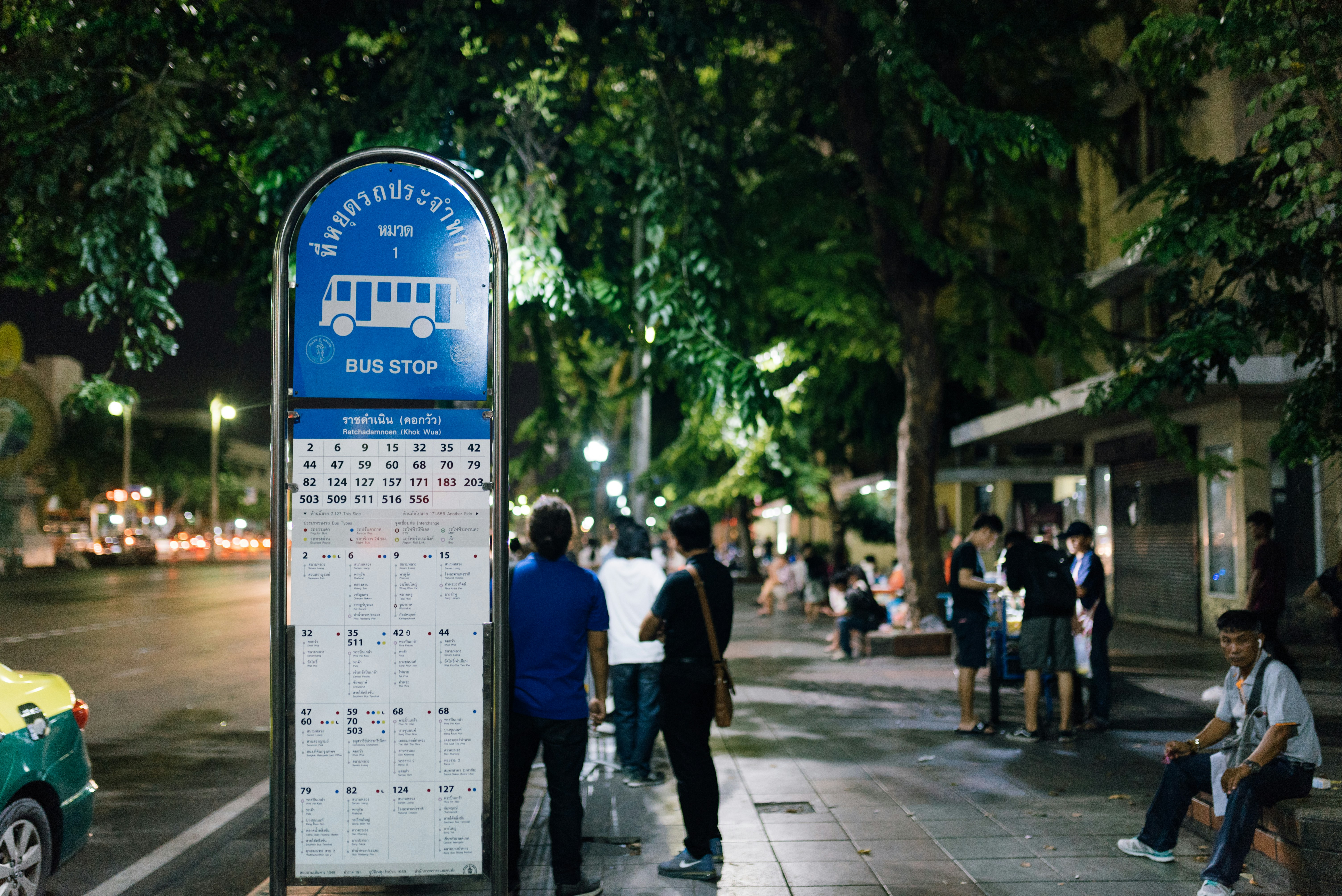 people walking on sidewalk during daytime