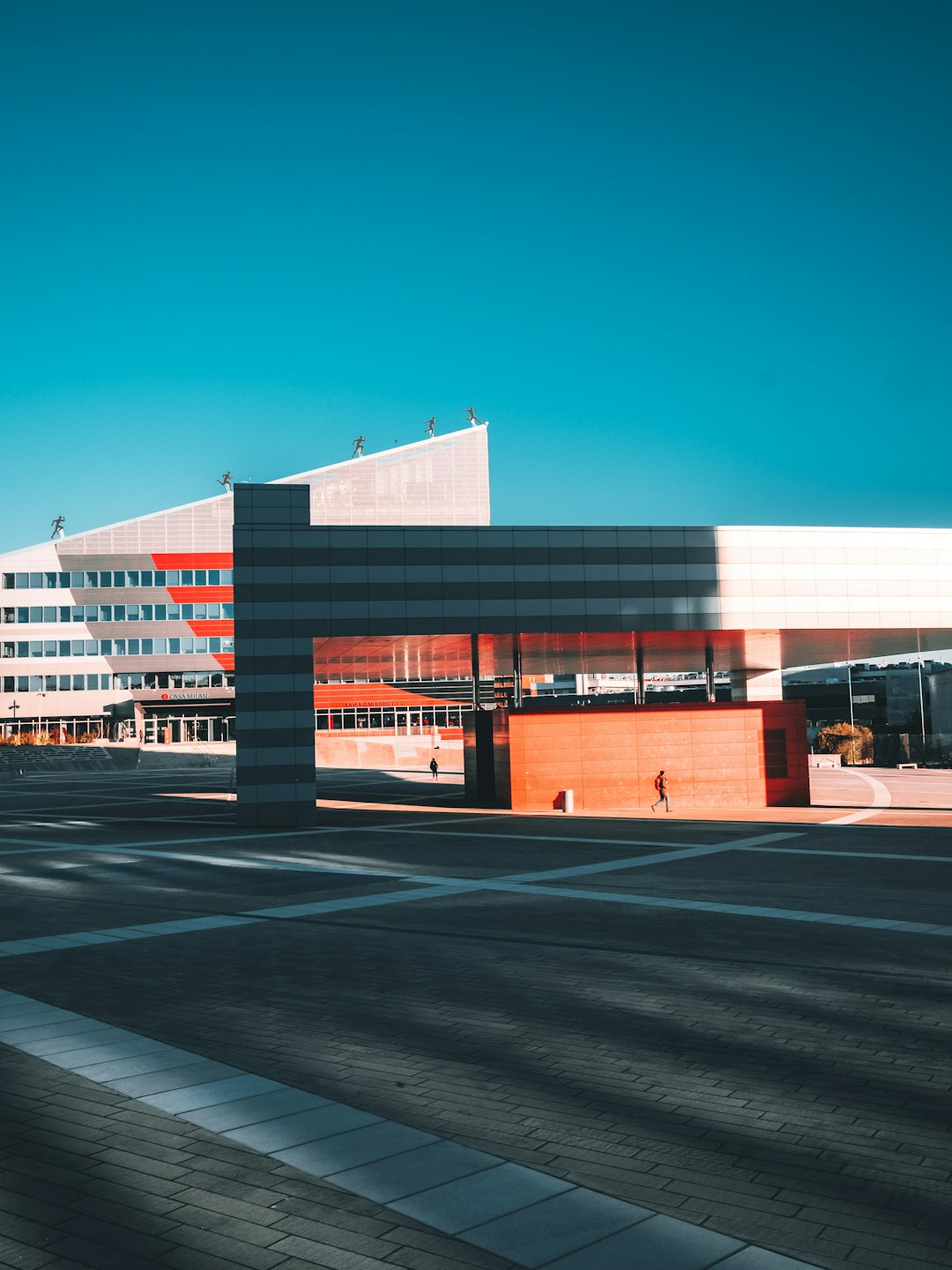 white and brown concrete building under blue sky during daytime