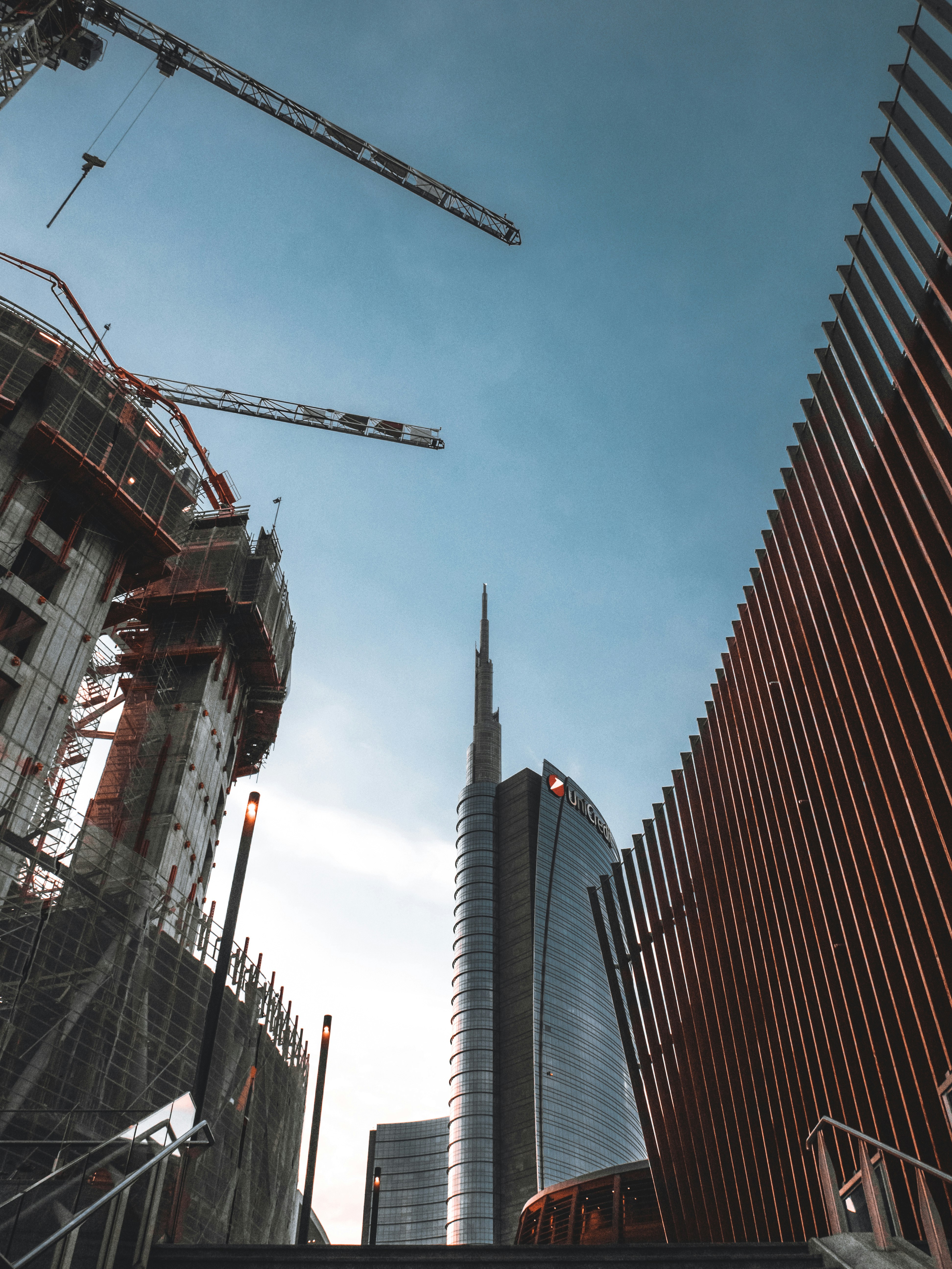 low angle photography of brown concrete building during daytime