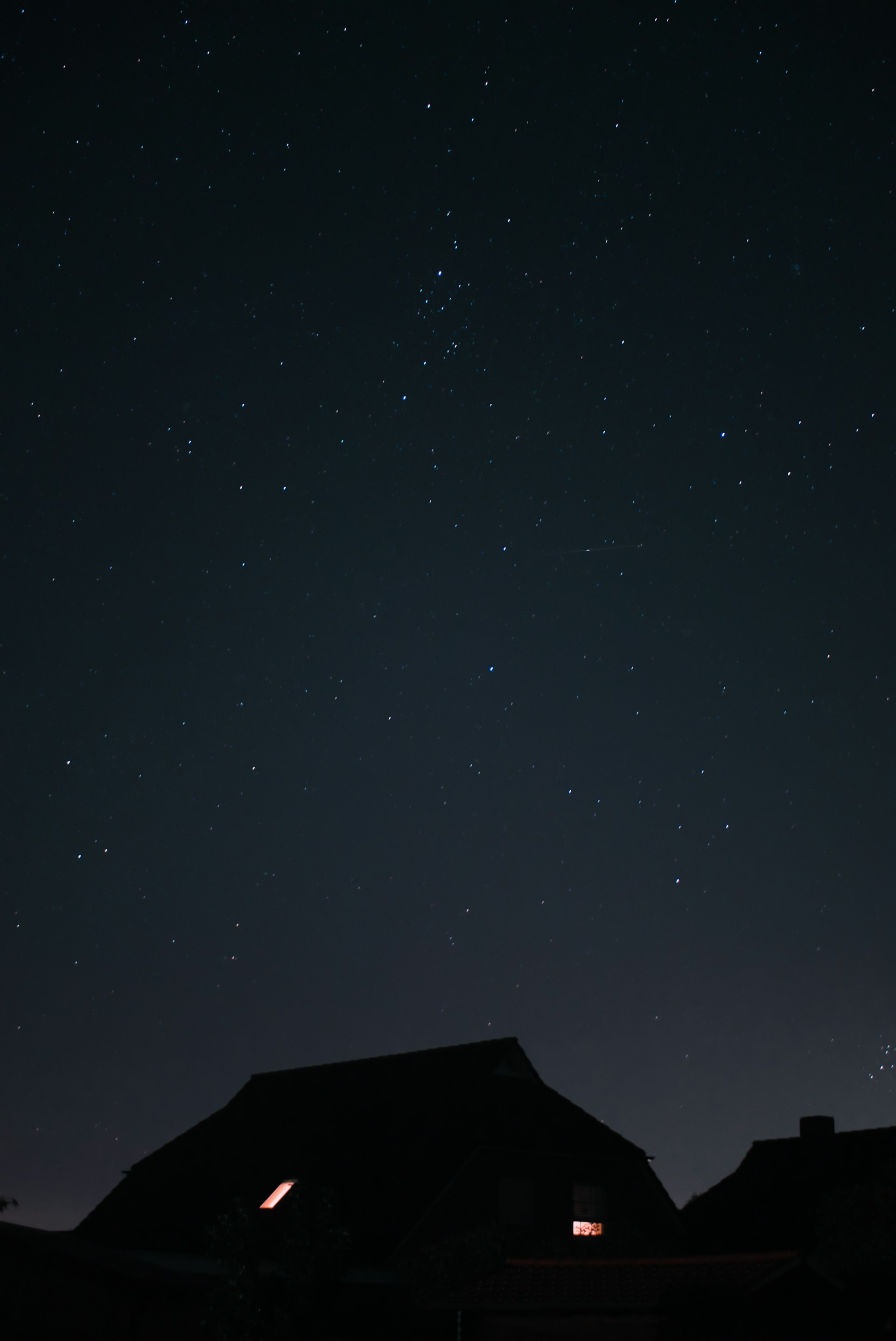 person wearing grey knit sweater