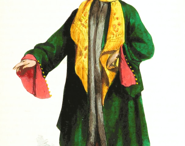 person in green and yellow traditional dress
