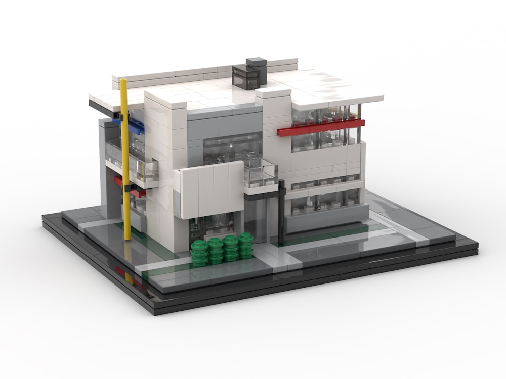 white and black building miniature