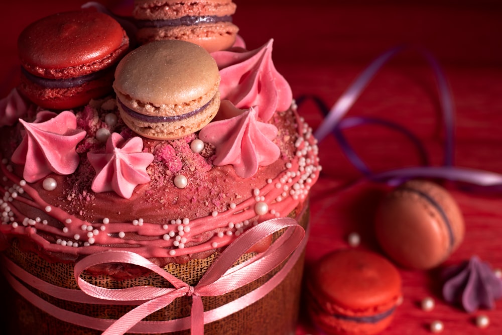 pink and brown cupcake with pink ribbon