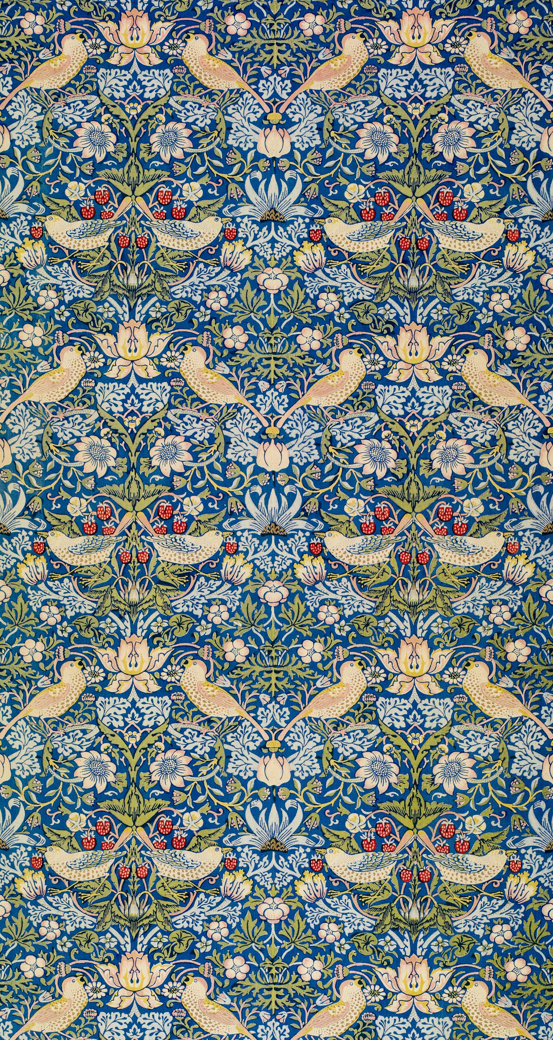 blue white and brown floral textile