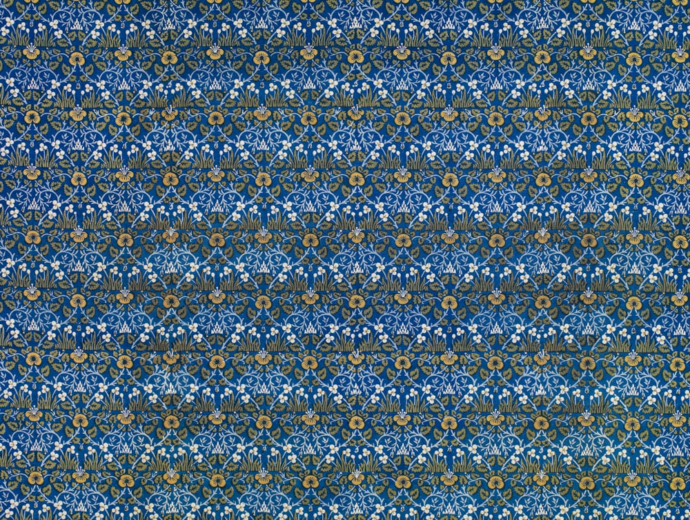 blue and yellow floral textile