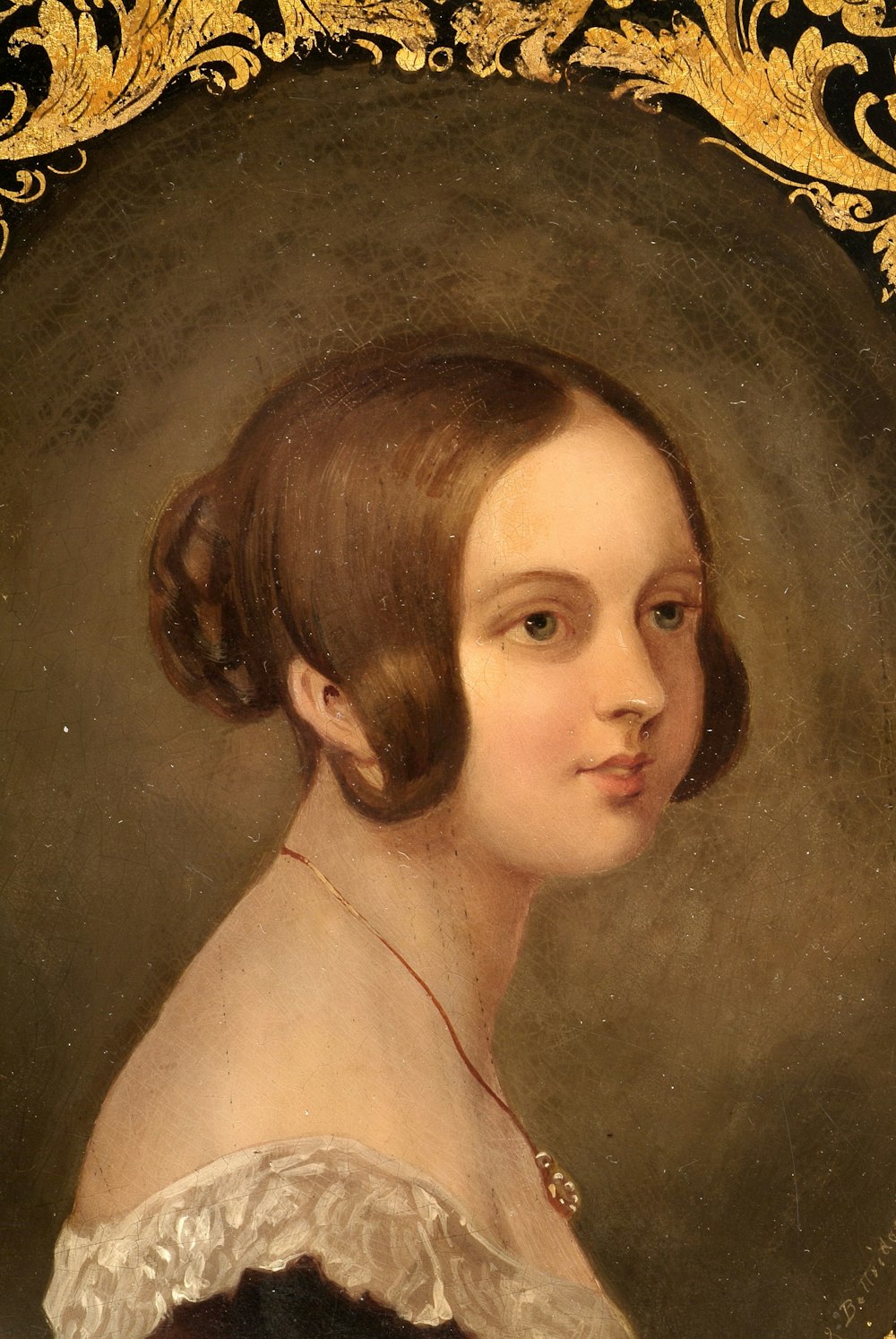 woman with brown hair painting