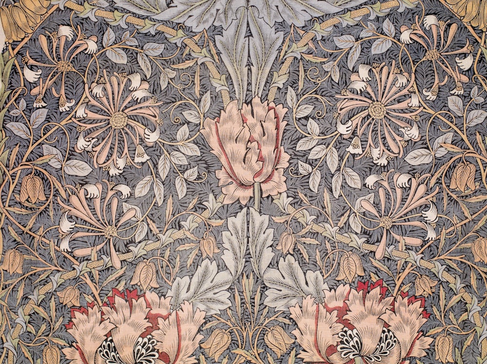 white blue and red floral textile