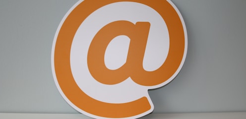 white and orange letter b logo