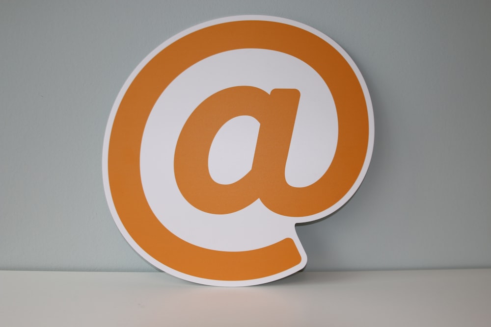 white and orange letter b logo
