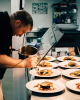 Chef demonstrating cooking technique