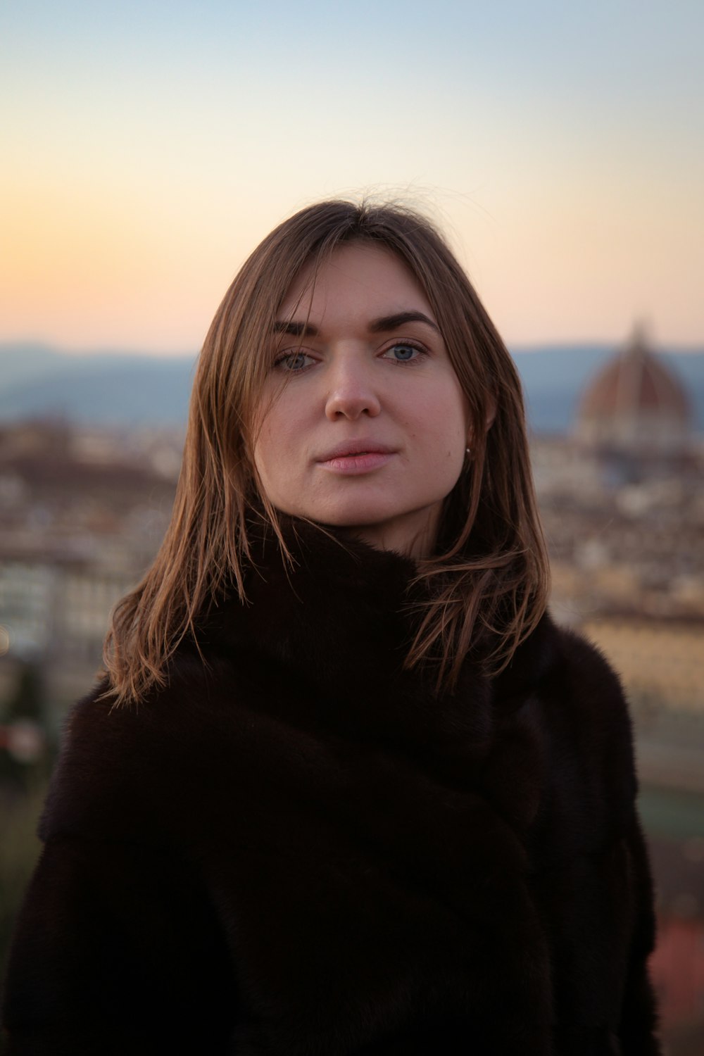 woman in black fur coat