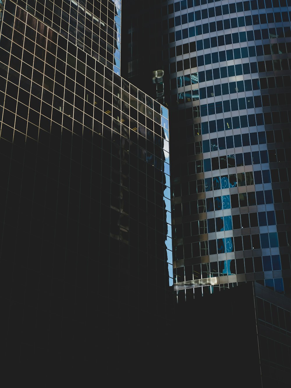 white and blue high rise building