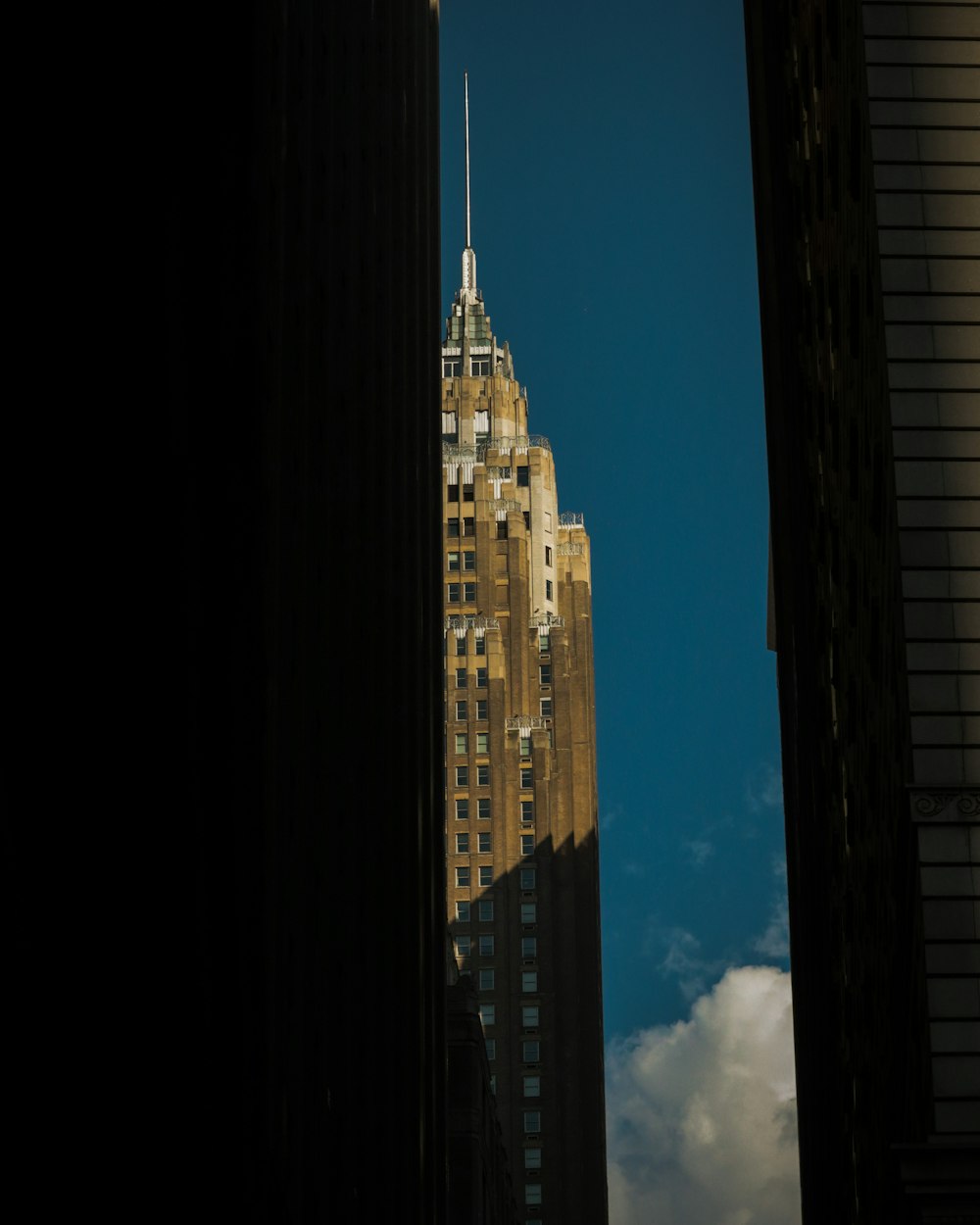 brown and white concrete buildings under blue sky during daytime