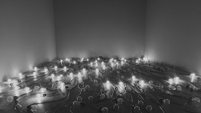 A cozy room illuminated by various LED fixtures.