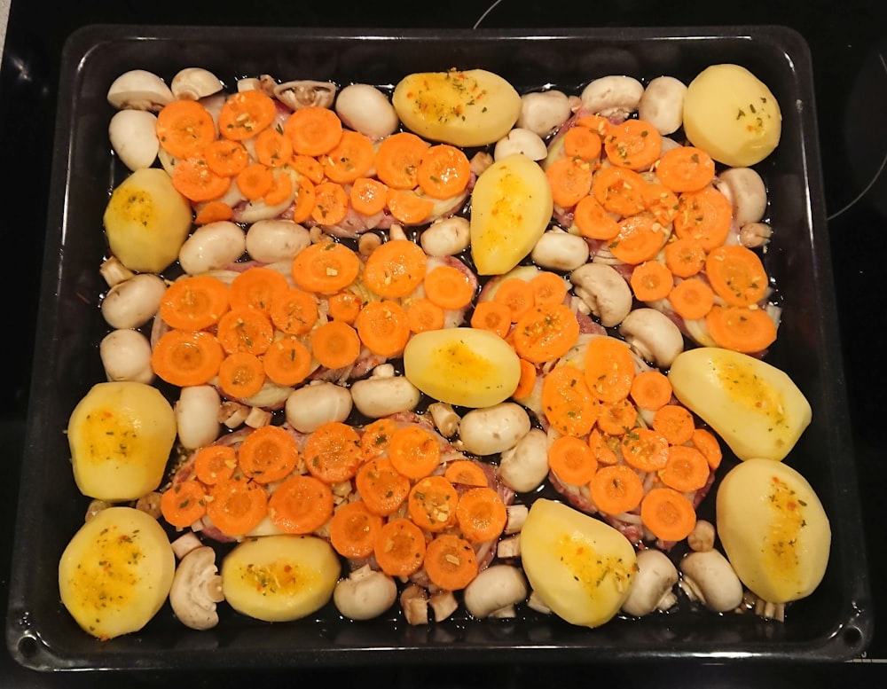 orange and green fruits on stainless steel tray