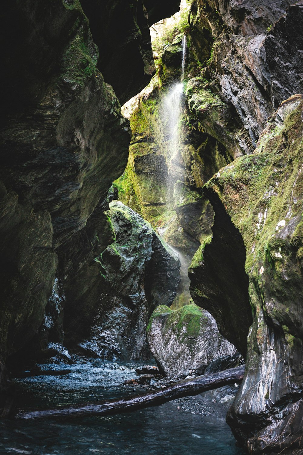 water falls on rocky mountain