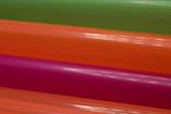 A close-up of various PVC-U profiles in different colors.