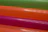 Close-up of a package with seven colorful gel units arranged neatly.