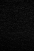 black textile in close up photography