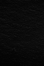 black textile in close up photography